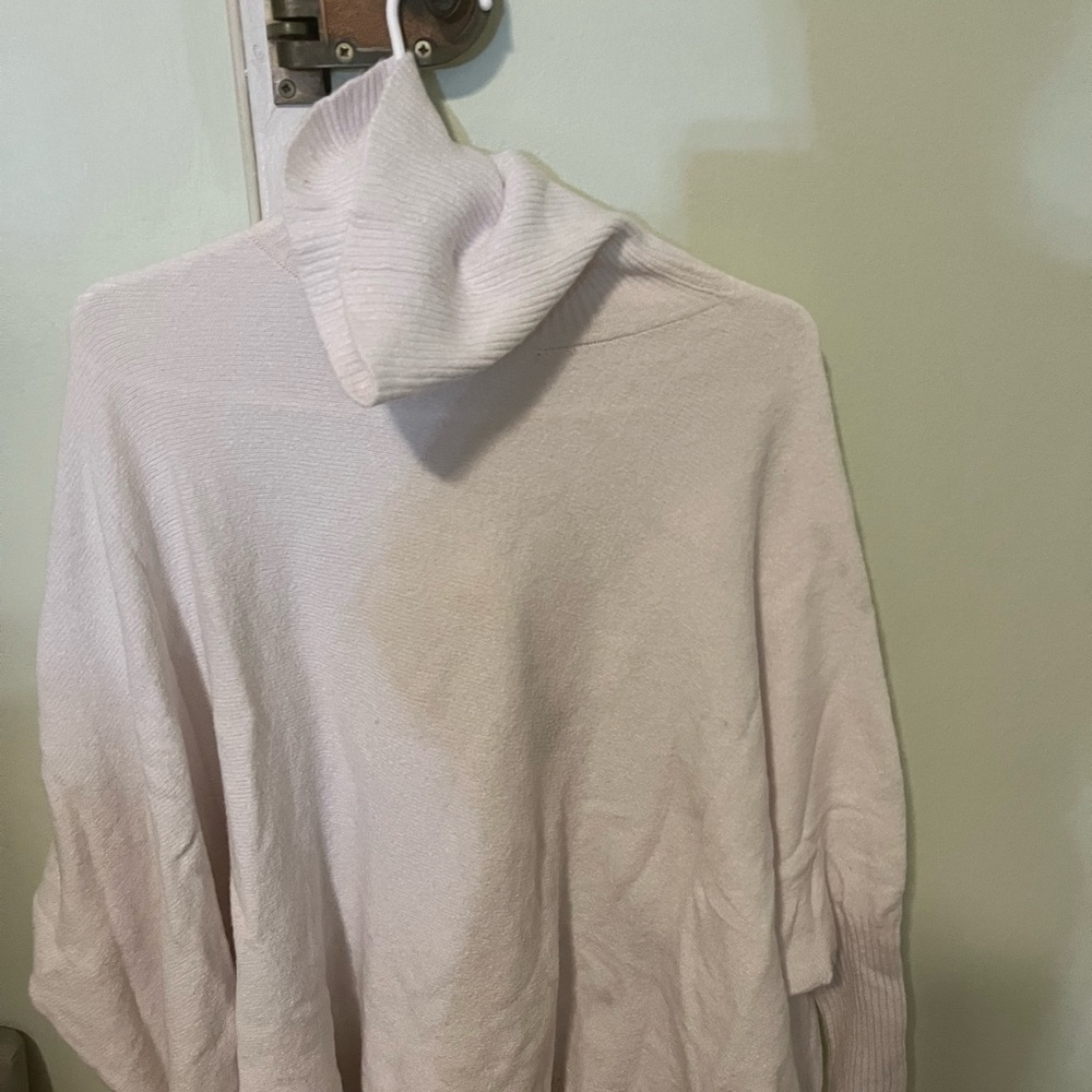 Adore Soft Cream Cowl Neck Sweater. Frey in the bottom